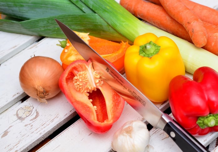 Consumer scanning a fresh produce QR code